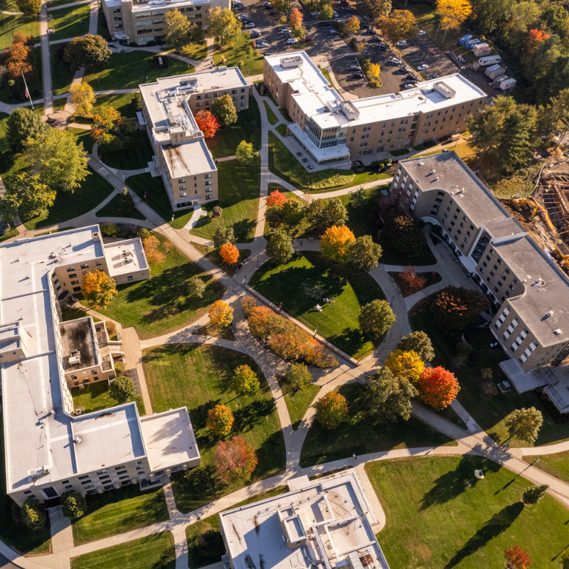 Aerial photo of the Quad showcasing fall foliage on campus