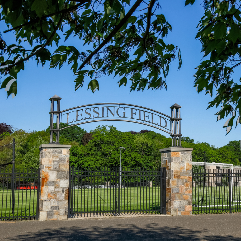 Baseball field wrought iron gates that feature the field name — 'Lessing Field'.